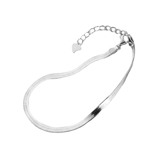 Flat silver bracelet on a white background.